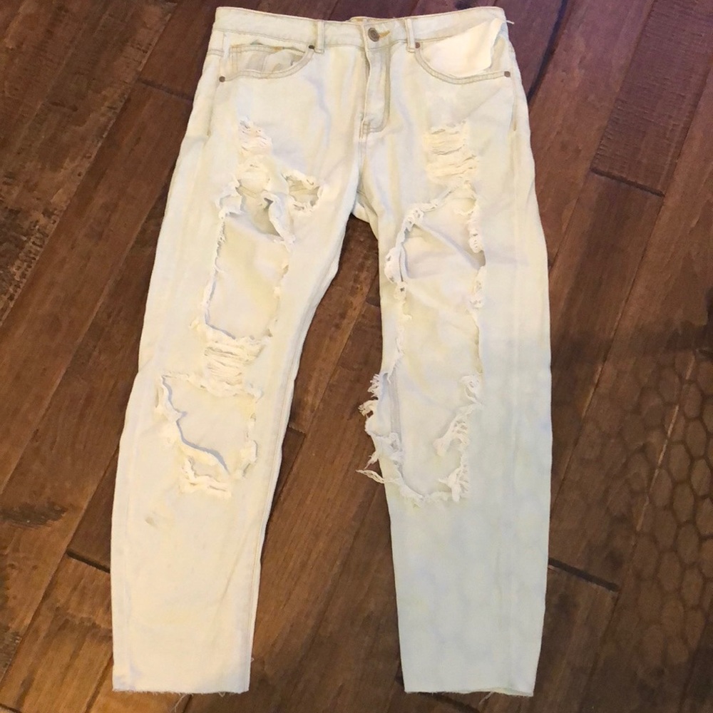 Light washed distressed denim jeans